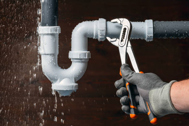 Professional Drain Cleaning technician working in Center Point, IA